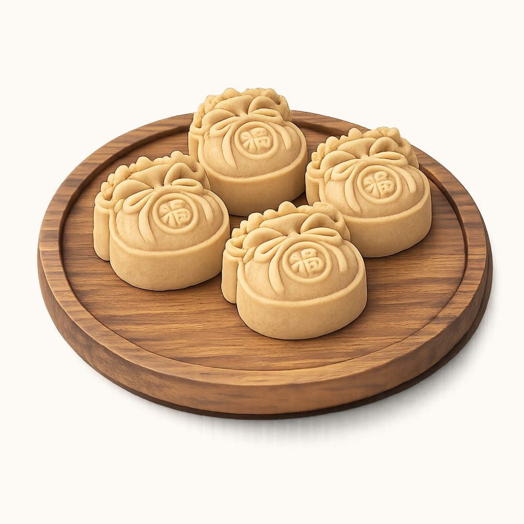 Five round golden-beige mooncakes with embossed Chinese characters, arranged on a round wooden serving tray against a clean off-white background.