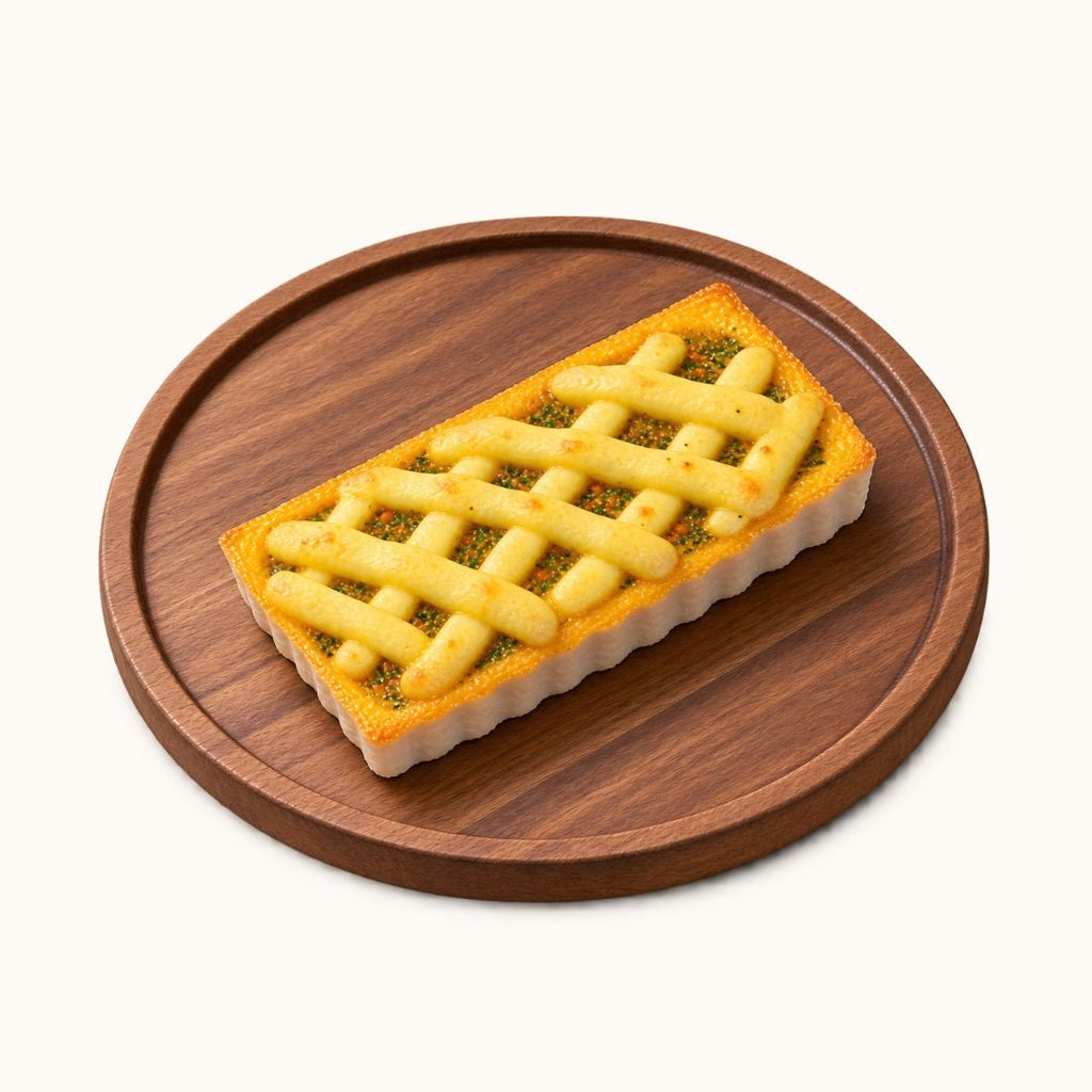 A rectangular lattice-crust tart with golden yellow filling sits on a round wooden serving board against a plain off-white background.