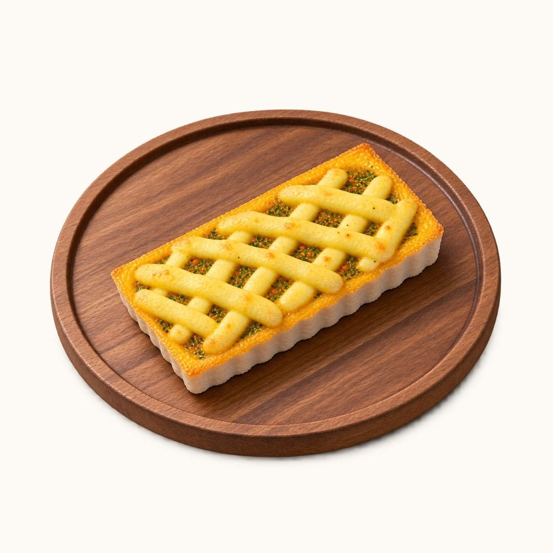 A rectangular lattice-crust tart with golden yellow filling sits on a round wooden serving board against a plain off-white background.